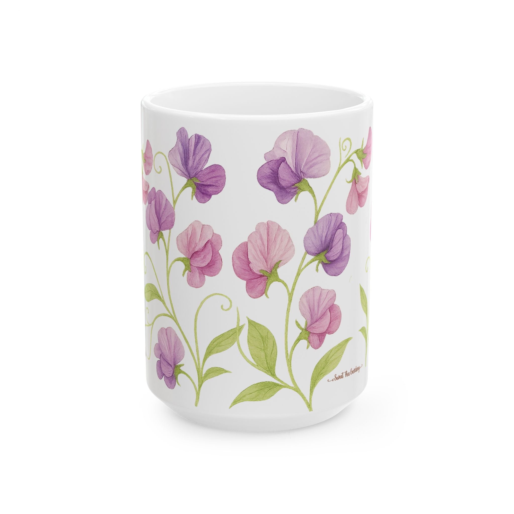 White mug with sweet peas purple and pink floral design on a white background