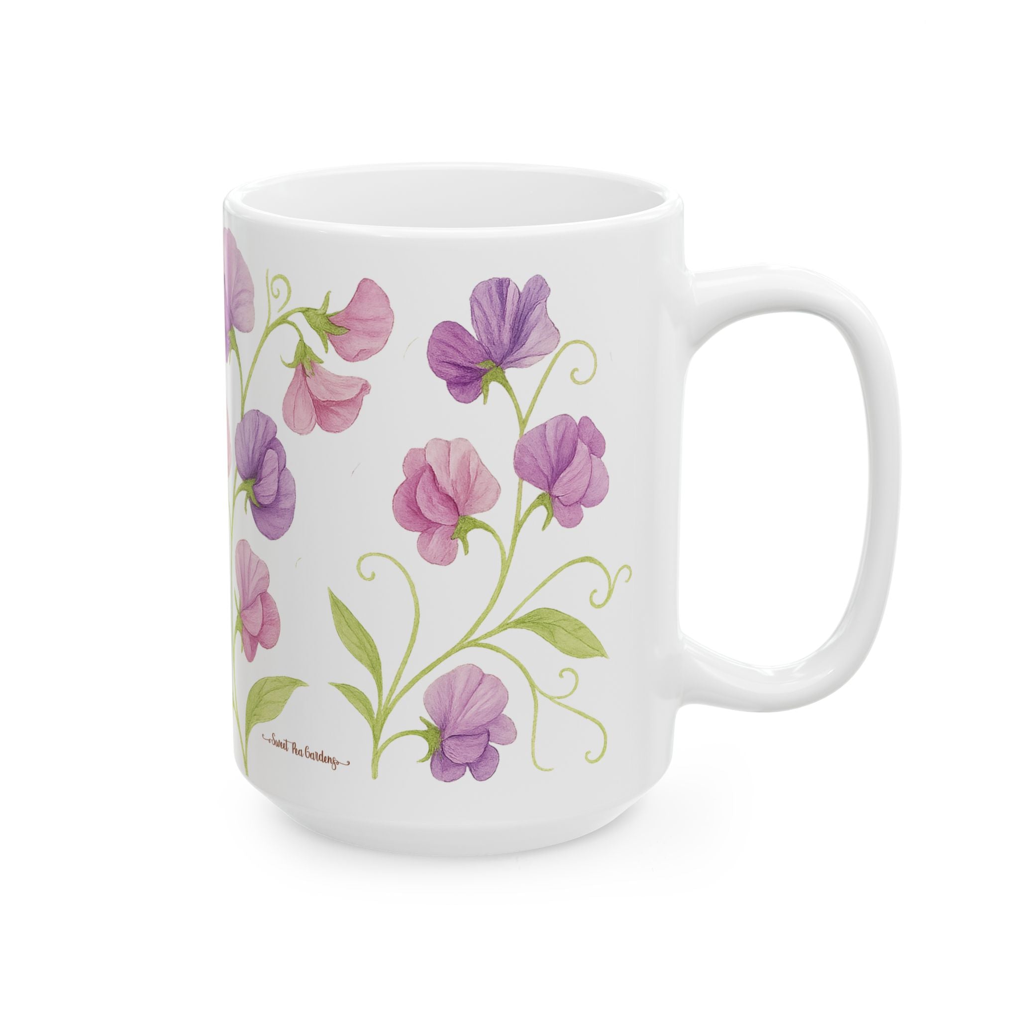 White mug with purple and pink sweet pea flowers floral design on a white background